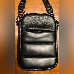 Black Quilted Cell phone Crossbody Bag. Front zipper pocket & back slit pocket.